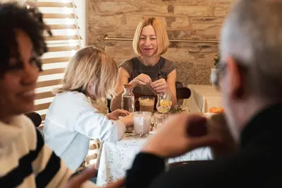 a group of people sitting at a table at Hostal Pension Artilleiro in Santiago de Compostela