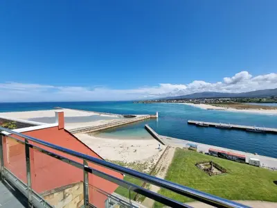 a view of the ocean from a balcony at Mirador al Cantabrico in Foz