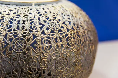 a brown vase with a design on it at Hotel Mica in Palas de Rei