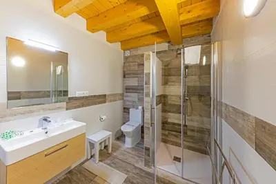 a bathroom with a sink and a shower at LA PANDELA in Las Herrerías