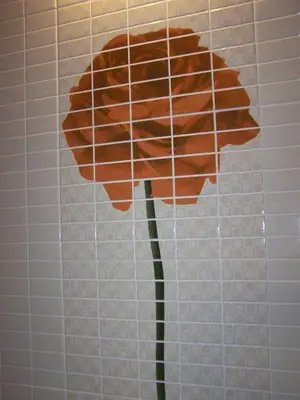 a paper hat hanging on a wall at A Casa de Mañas in Mondoñedo
