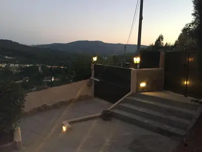 a set of stairs with lights on top of a building at Casa de Sabela in Culleredo