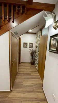 a hallway with a hallway leading to a room at LAST 12K in Santiago de Compostela