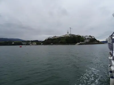 a view of a body of water with an island at Apartamento Apega in Ribadeo