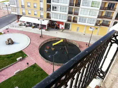 an aerial view of a playground in a city at Duplex Tres Dormitorios Playa A Rapadoira in Foz