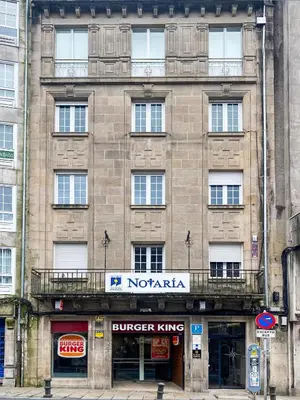 a building with a burger king sign in front of it at Plaza Obradoiro Express by Bossh! Hotels in Santiago de Compostela