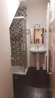 a bathroom with a sink and a shower at Camino Real in Molinaseca