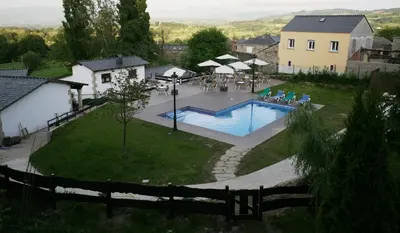 an overhead view of a swimming pool in a yard at Casa Barbadelo in Sarria
