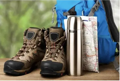 a pair of hiking boots next to a backpack at Paraiso del Bierzo in Las Herrerías