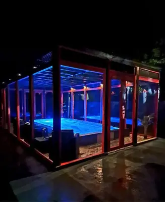 a lit up room with blue and red lights at A Pontiga I Casa Rural in Mezonzo