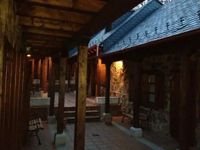 an inside view of a building with wooden beams at Alojamientos Rurales El Fontano in Galende