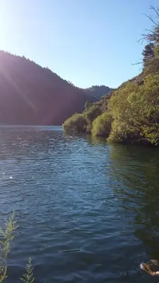 a view of a body of water next to a mountain at Casa do Bouza Vello in Sober