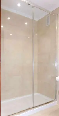a shower with a glass door in a bathroom at RyS Ourense Centro PARKING Gratis in Ourense