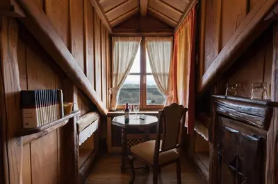 a small room with a table and a window at Prada a Tope - Palacio de Canedo in Canedo