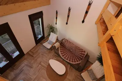 an overhead view of a living room with a table and chairs at A Casa das Burgas in Cuntis