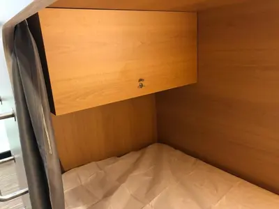 a cupboard with a drawer in a room at Andaina in Sarria