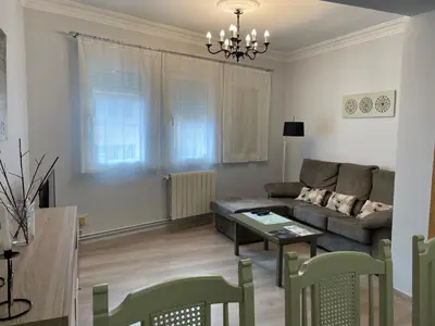 a living room with a couch and a table at CALLE HUERTAS Nº 17 - 1º in Lugo