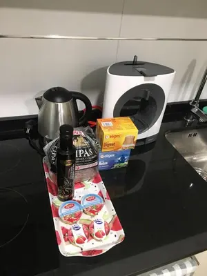 a counter top with a tea pot and some food at Lugo 360 in Lugo