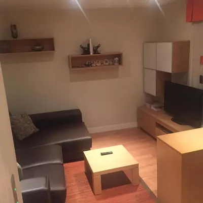 a living room with a couch and a coffee table at Bierzo centro in Ponferrada