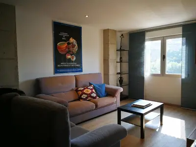 a living room with a couch and a coffee table at Ponferrada Castillo in Ponferrada