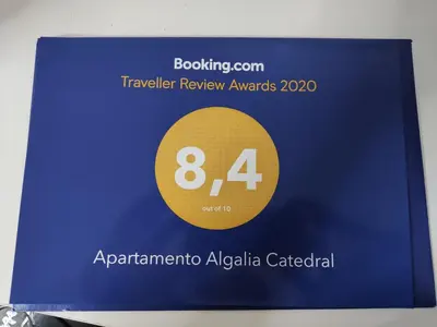 a blue book with a yellow circle on it at Apartamento Algalia Catedral in Santiago de Compostela
