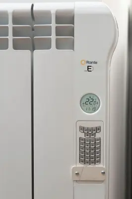 an electronic thermometer on a hospital bed at Apartamento Algalia Catedral in Santiago de Compostela