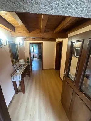an overhead view of a living room with a wooden floor at Casa Rural Anxeliña in Boborás
