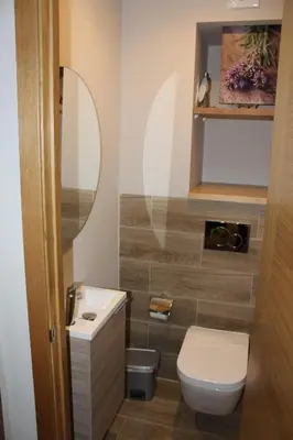 a bathroom with a toilet and a sink and a mirror at Rosalía de Castro, 41 - Centro - VUT-CO-01904 in Santiago de Compostela