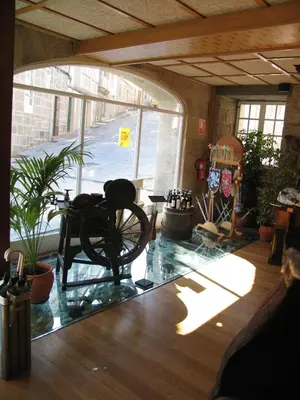 a room with a glass floor with a chair in it at Hotel Casa de Caldelas in Castro Caldelas