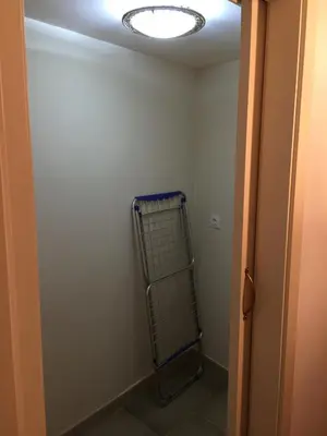 a hallway with a towel rack and a light on the ceiling at Bonita Casa en Pontedeume in Puentedeume