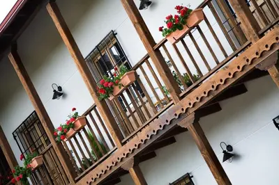 an overhead view of a building with flower boxes and stairs at Hotel Rural La Peregrina in Carucedo