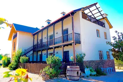 a large white building with balconies on it at Hotel Rural La Peregrina in Carucedo