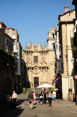 a group of people walking in front of a building at Hotel Irixo in Ourense