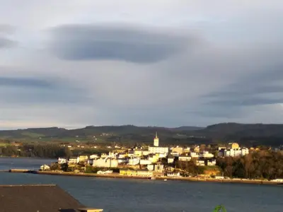 a view of a town on the water at Mirador de la Ría in Ribadeo