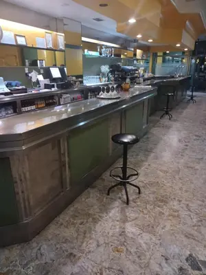 a bar in a restaurant with a bar stool at Hotel 2 de mayo 2 in Xinzo de Limia