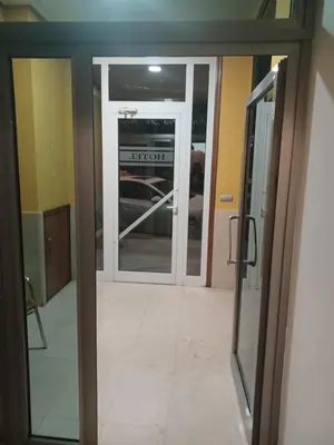 an open glass door in a room with a tile floor at Hotel 2 de mayo 2 in Xinzo de Limia