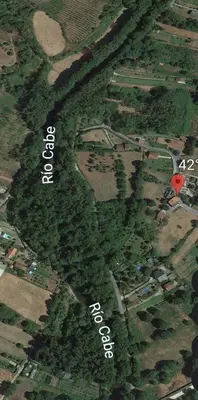 a map of a forested area with a red spot at Casita junto al Río en un entorno natural in Monforte de Lemos