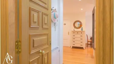 a door leading into a hallway with a room at Apartamento Plaza de España in Ribadeo