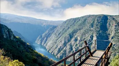 a view of a river in a valley at María Belkis ll in Ourense