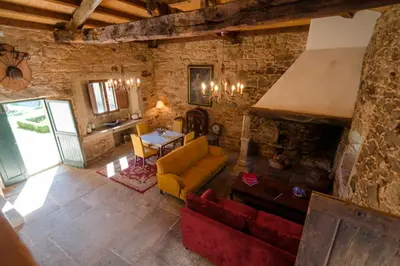 an overhead view of a living room with a couch and a table at Pazo de Eidian in Eidián