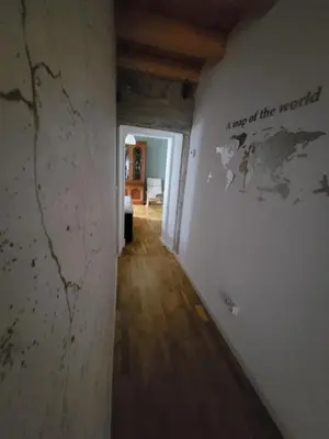 a room with a map of the world on the wall at Casa Maral in Pontevedra