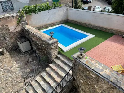 an overhead view of a swimming pool in a yard at Casona Las Burillas in Villar de los Barrios