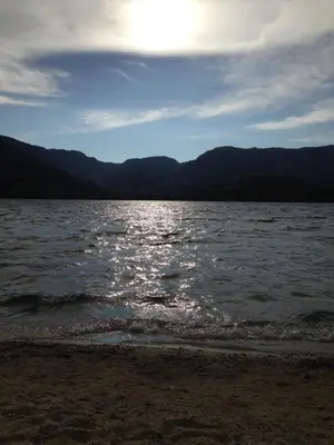 a body of water with the sun in the sky at Casa Sanabresa in Galende