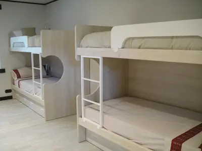 a room with two bunk beds in a room at Casa Pro Pantea in Monforte de Lemos