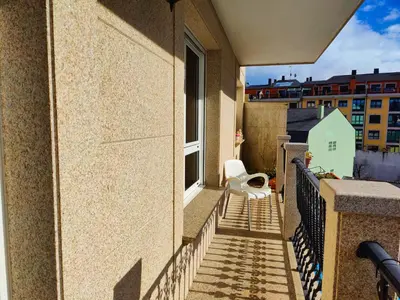 a toilet sitting on the balcony of a building at Casa-Nova 2 in Sarria