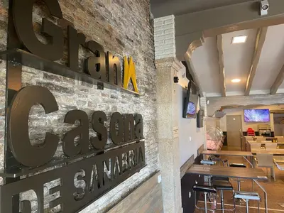a restaurant with a sign that reads c sanchezarma at Hotel Gran Casona de Sanabria in Puebla de Sanabria