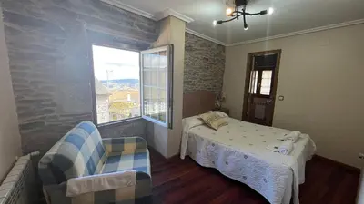 a bathroom with a sink and a toilet in it at Casa Alberto in Castro Caldelas