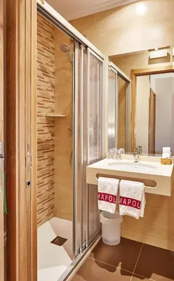 a bathroom with a shower and a sink at Mapoula PR Boutique in Santiago de Compostela