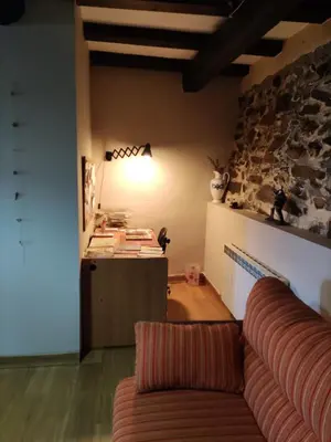 a room with a mirror on the side of a wall at Falagueira in Monforte de Lemos