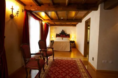 a bathroom with a sink and a bath tub at Hotel Vila do Val in O Valadouro